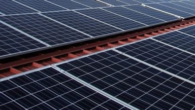 Roof plate and photovoltaic panels